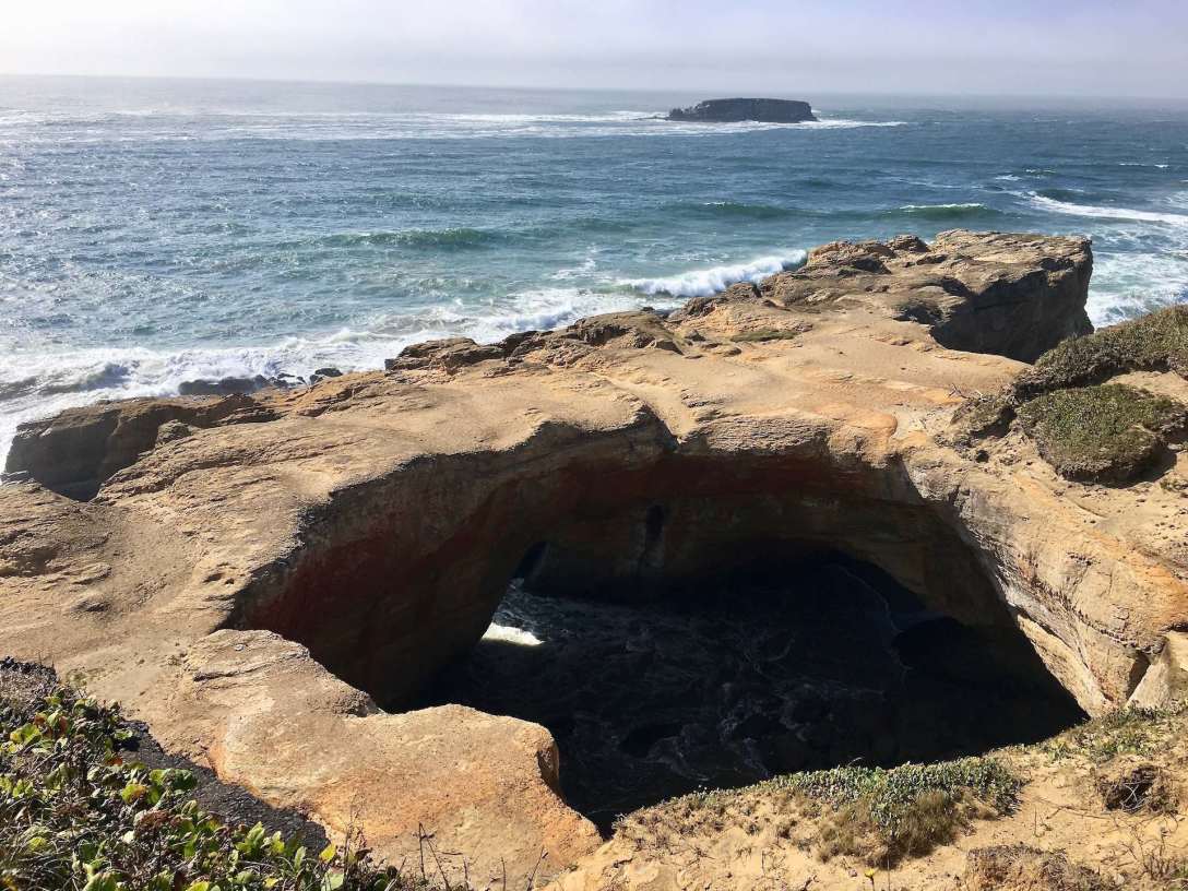 The Devil's Punchbowl Rock formation, Oregon Coast Highway 101