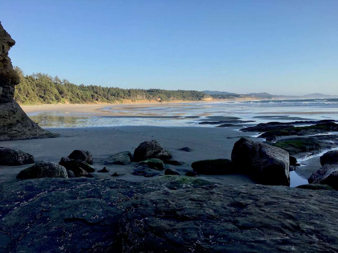 Surf spot on Beverly Beach near Devil's Punchbowl State Natural Area, Otter Rock, Oregon