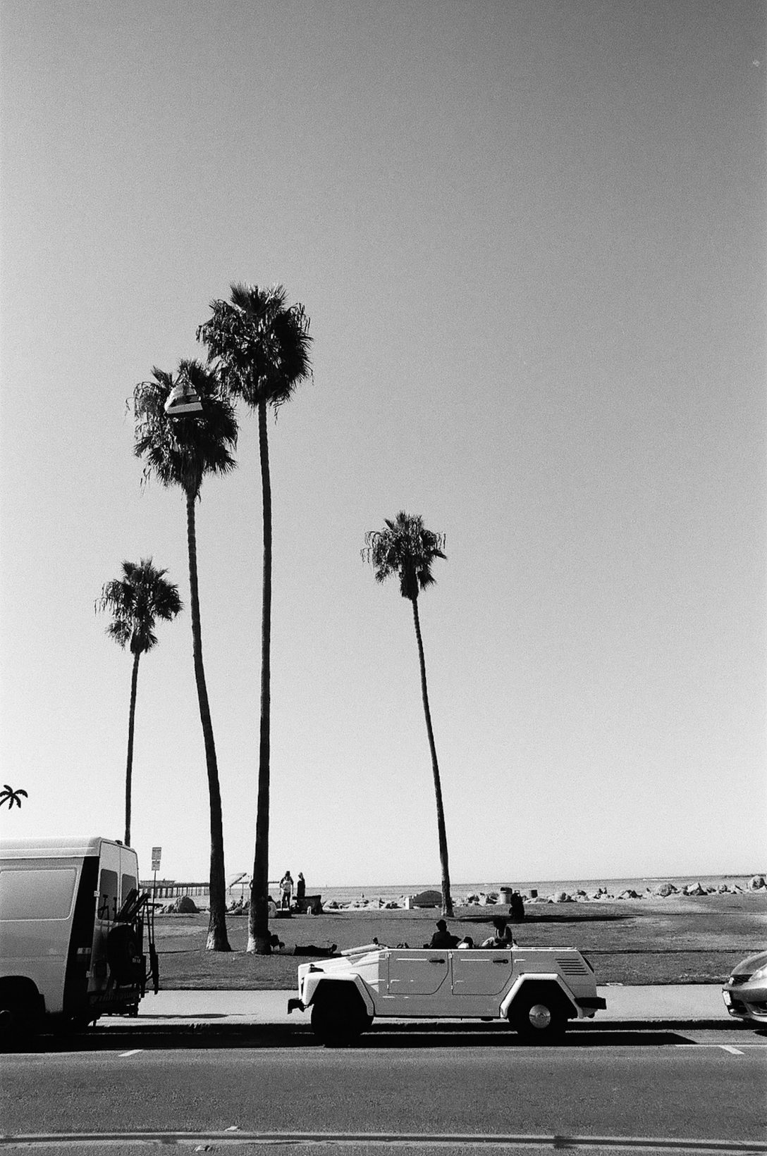 35mm film photography black and white VW Thing and Palm Trees at Ocean Beach in San Diego California Nikon F2