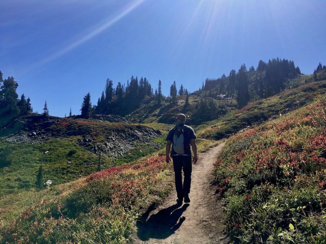 Hiking through subalpine forest via the Naches Peak loop trail in Okanogan-Wenatchee National Forest