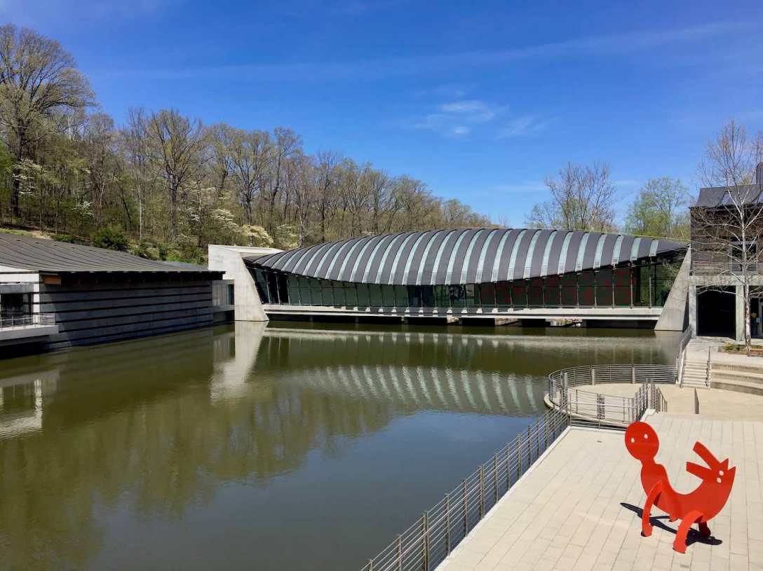 Banded Copper Roof and pond Moshe Safdie-designed Crystal Bridges Museum of American Art in Bentonville, Arkansas