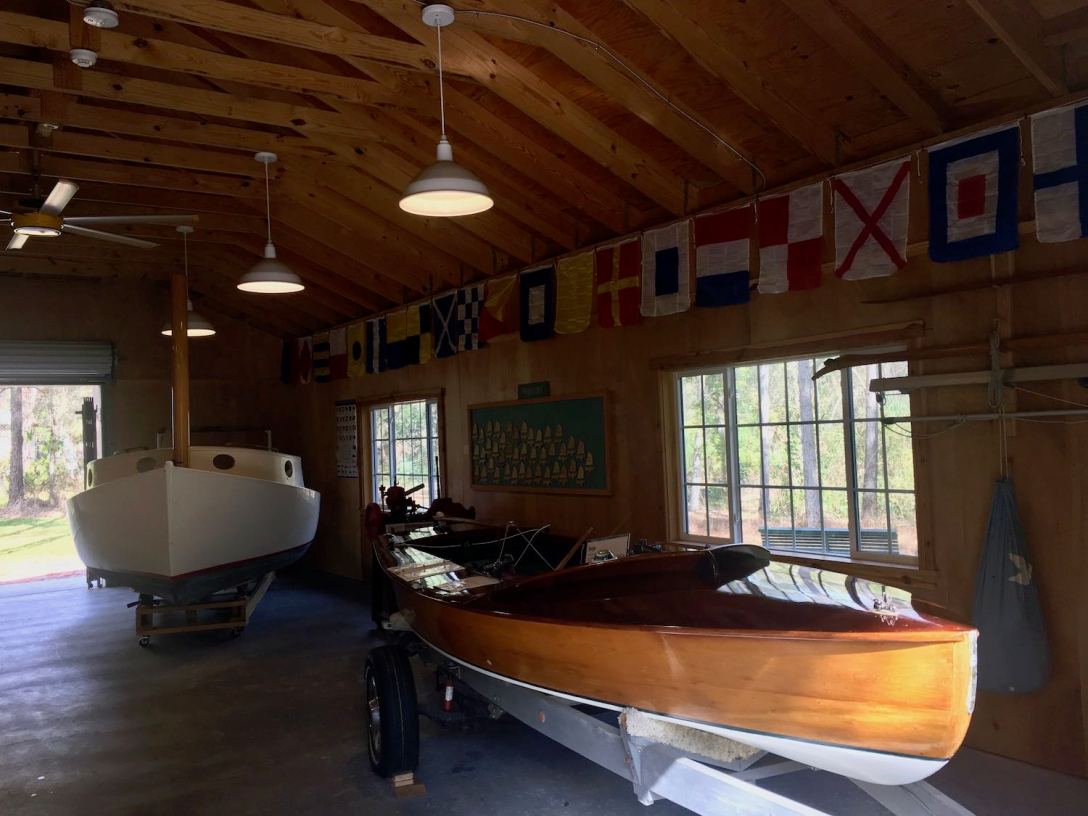 Honey the Snipe and a Sun Cat built by Clark Mills at the Mckay Creek Boat Shop in Pinellas County Florida