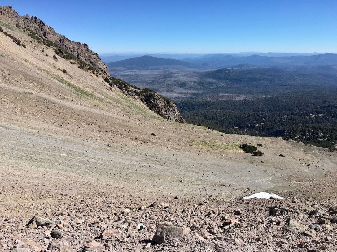Lassen Peak smoothed by glaciers, beyond it skeleton forest visible from recent wildfires