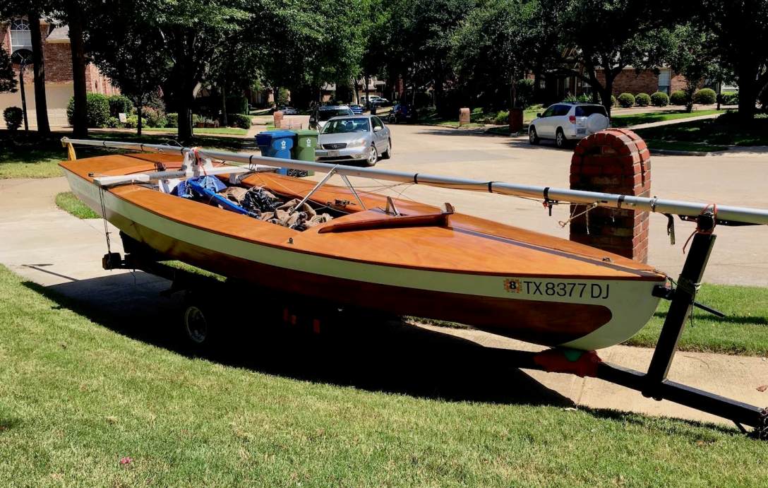 Restored wooden snipe sailboat
