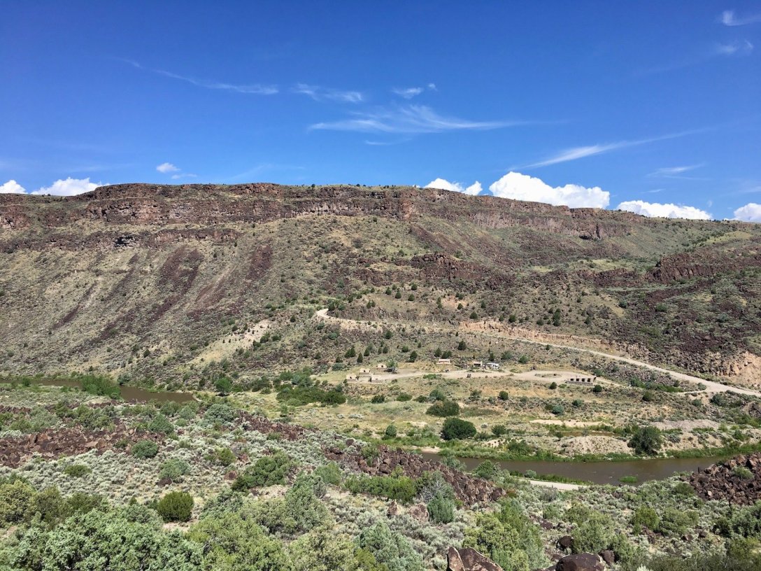 View of the tiny Taos Junction campground and NM-570 up the Western side of the Rio Grande Gorge